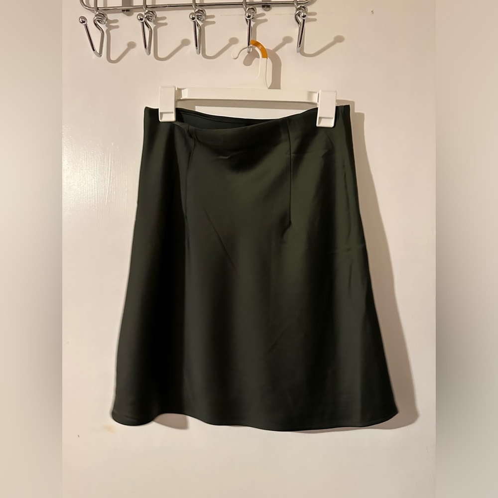 Dark green mini skirt